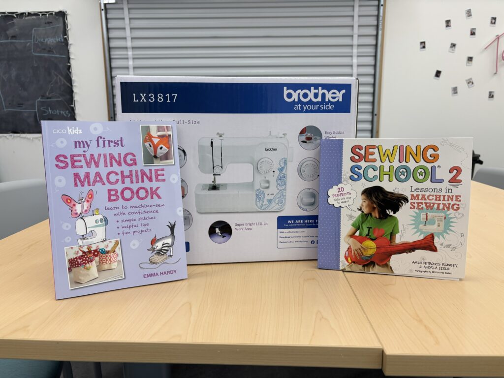 Sewing Machine with instruction books.